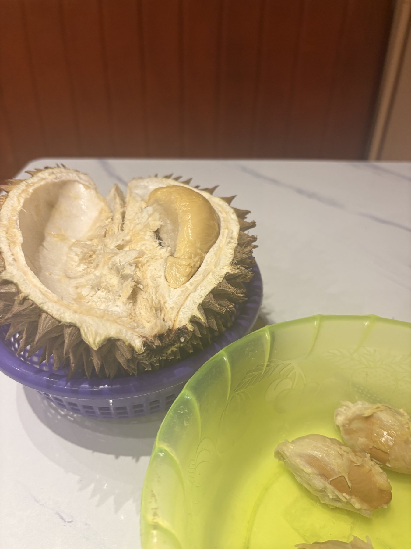 An opened durian fruit ready to eat